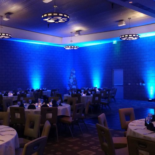 Holiday party with deep blue up lighting at The Valley Ho.